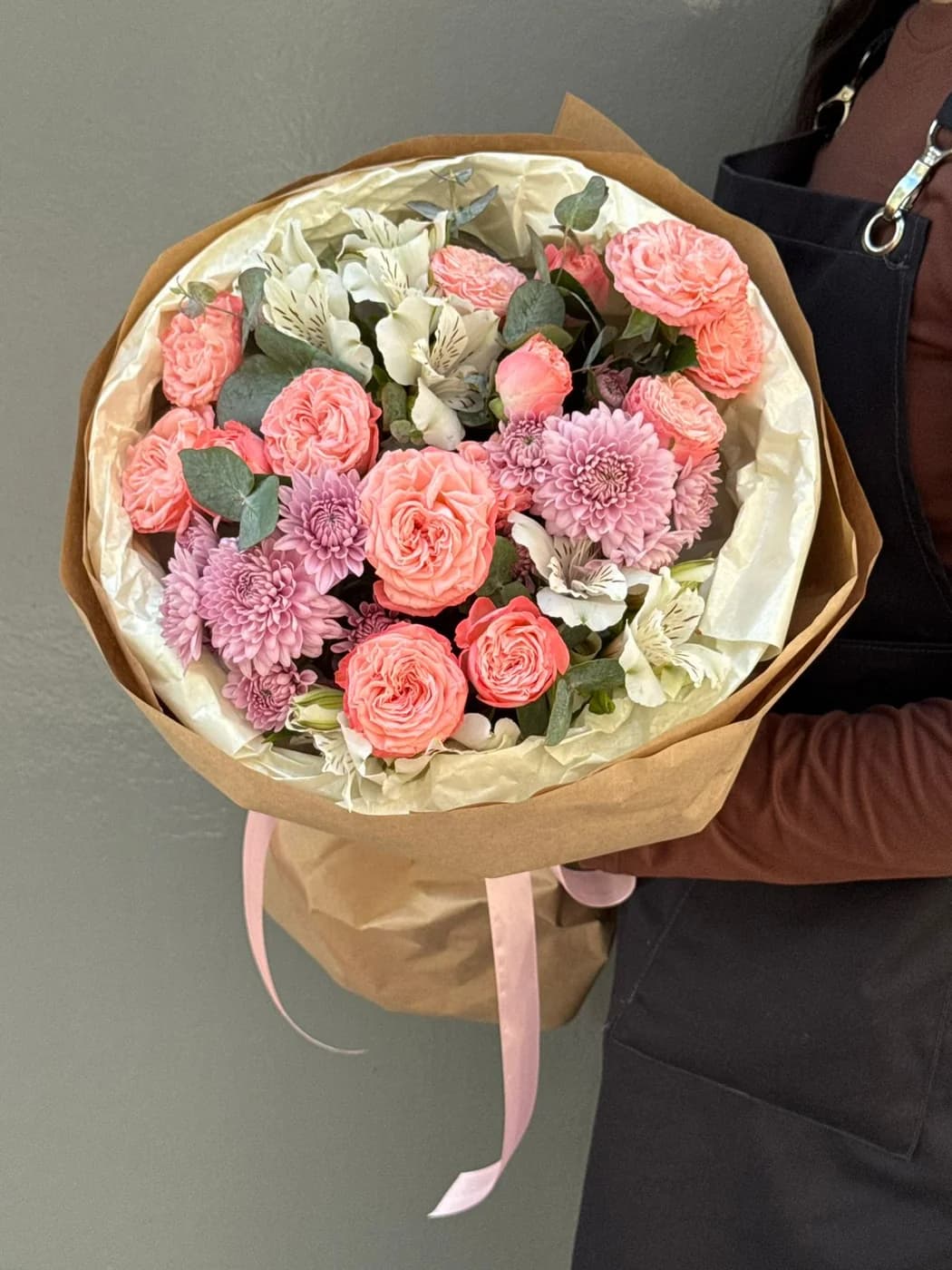 Mixed bouquet of spray roses Madam Bombastic, spray chrysanthemums, and alstroemerias.