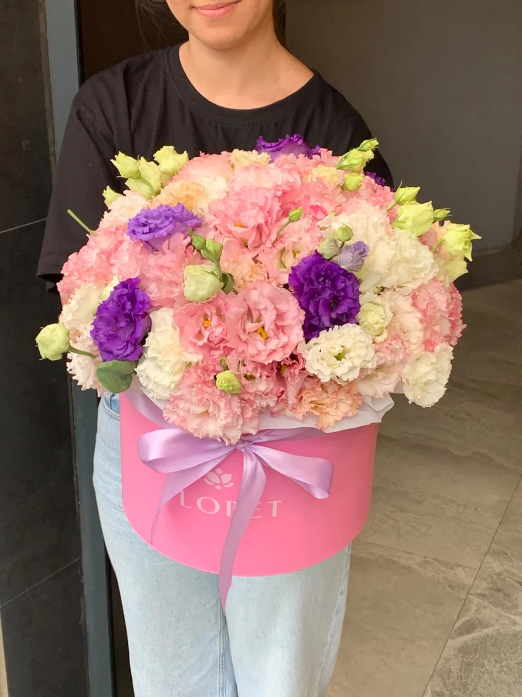 Arrangement of Purple and Pink Eustomas in a Box