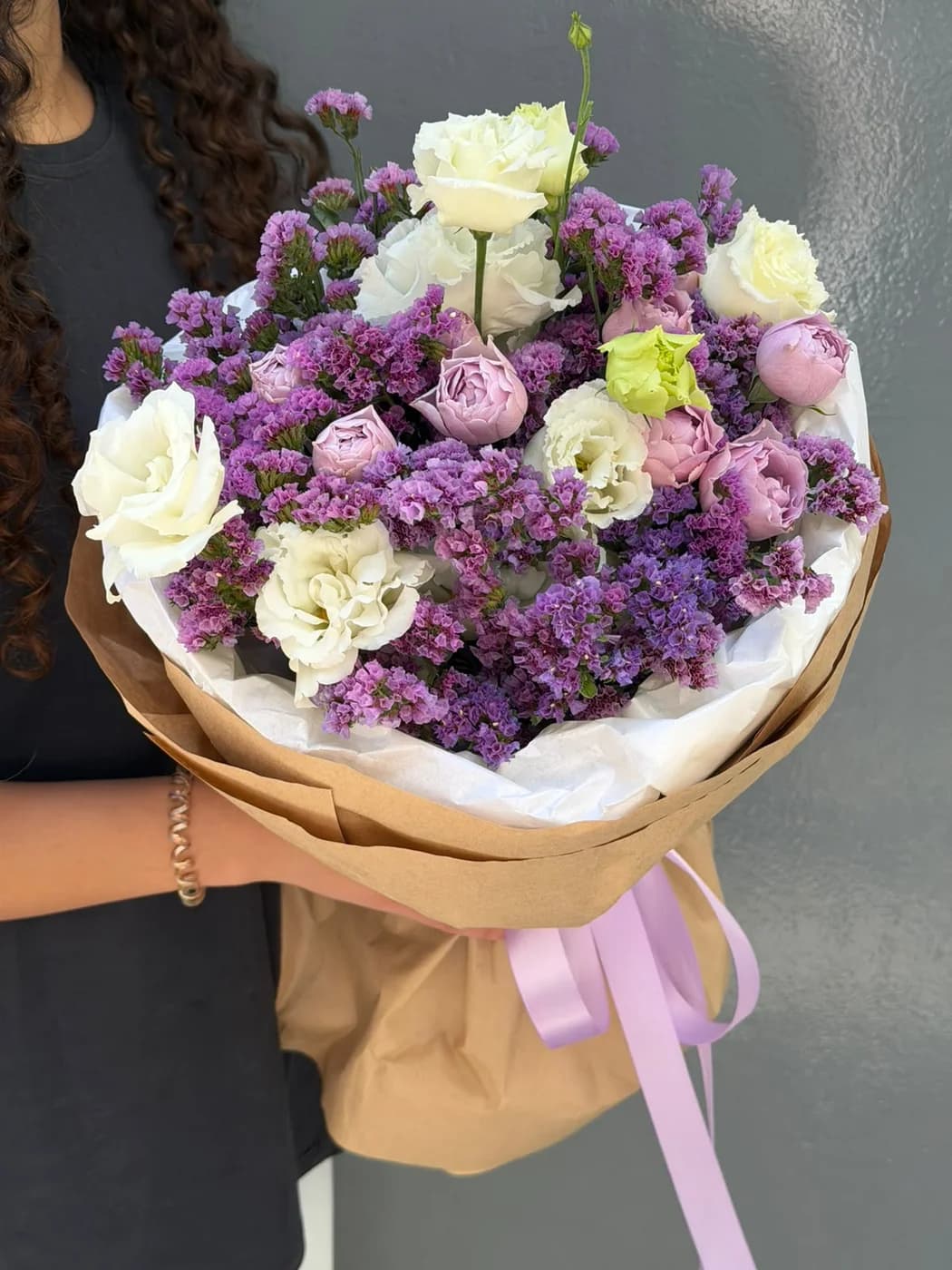 Mix bouquet of Lavender Bubbles spray roses, eustoma and statice