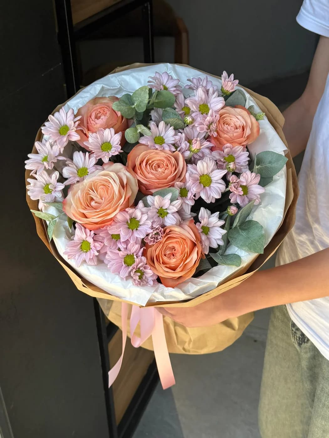 Duo bouquet with Kahala roses and pink spray chrysanthemums.