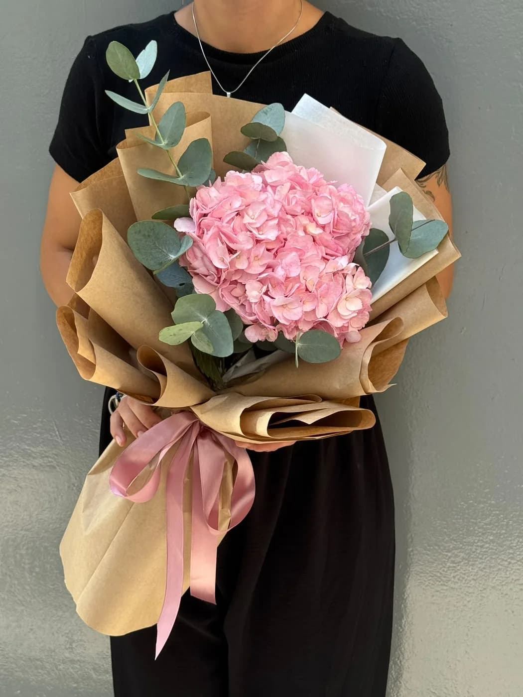 Mono bouquet of pink hydrangeas.