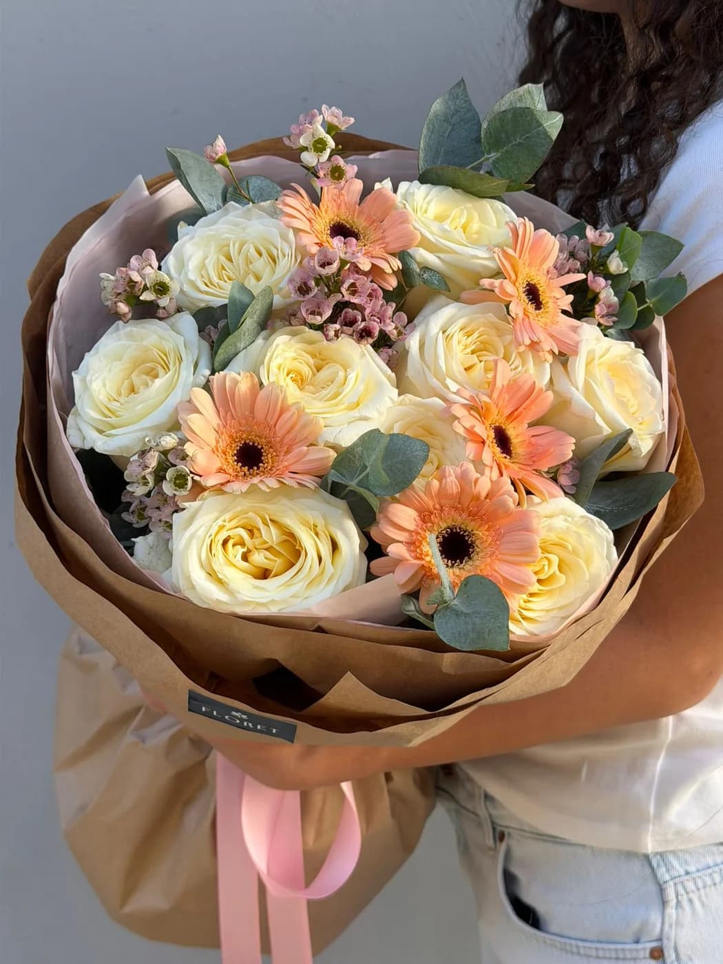 Mixed bouquet of hydrangeas, gerberas, Nutan flowers, and Harper spray roses.
