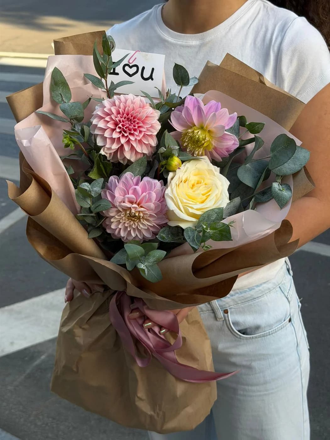 Mixed bouquet of peach and pink dahlias and Candle Light roses.