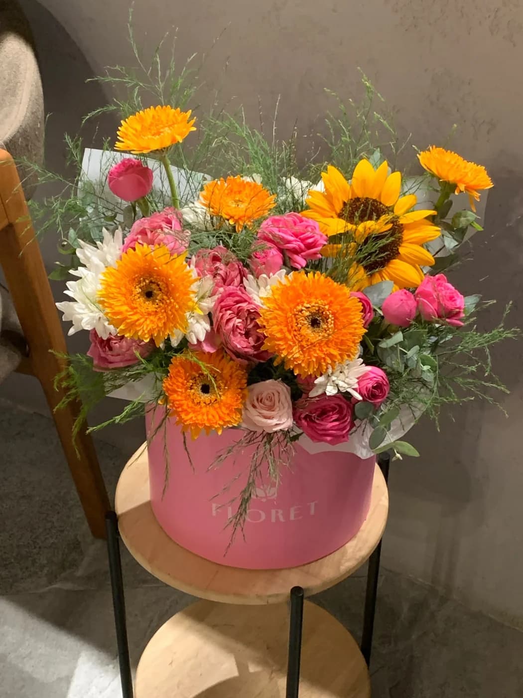 A box arrangement made with Juliett Cerise, Giselle Pink, Gerbera Yellow and Lady White.